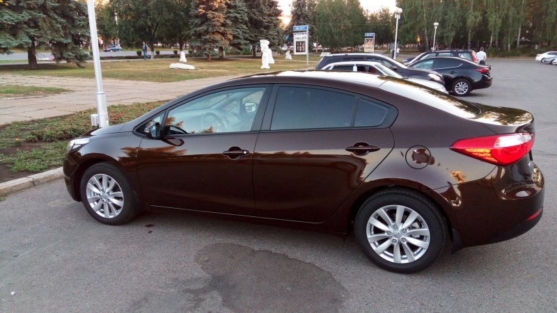Kia Cerato коричневый