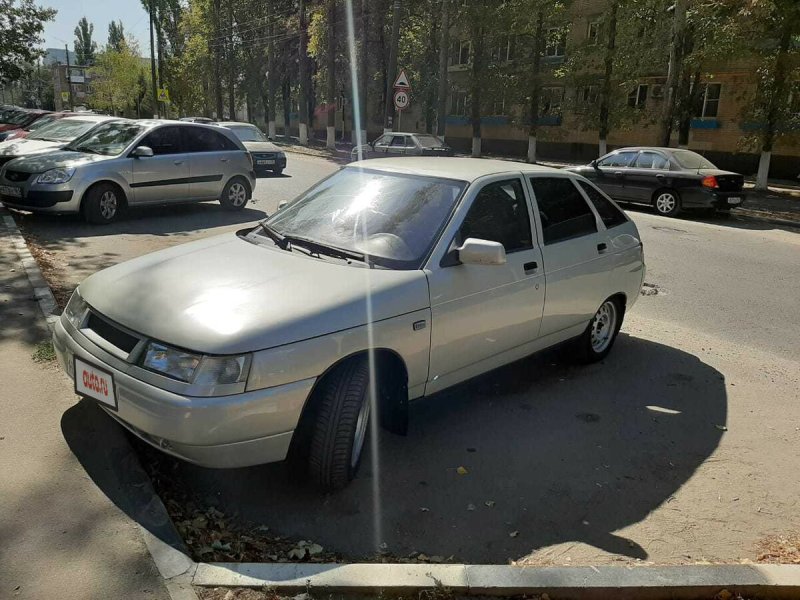 ВАЗ 2110 молочно-белый серебристый