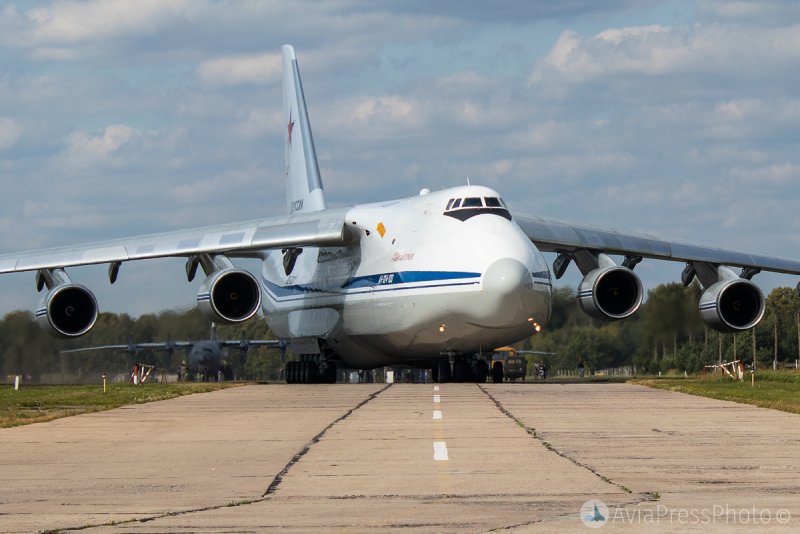 АН 124 100