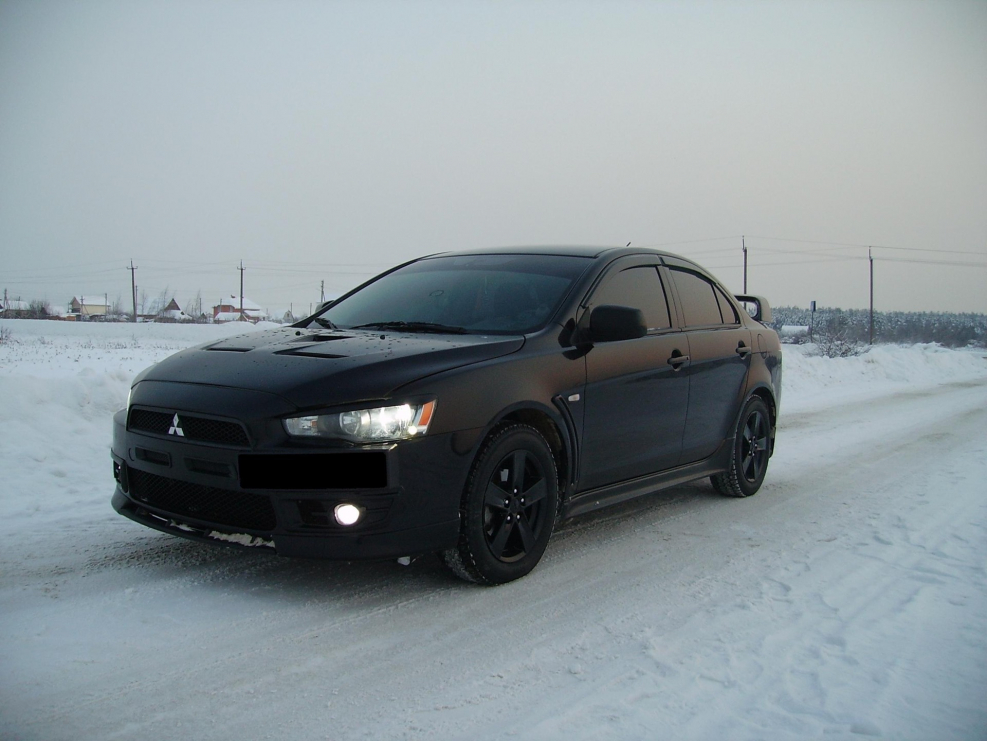 Лансер 10 2010 года черный