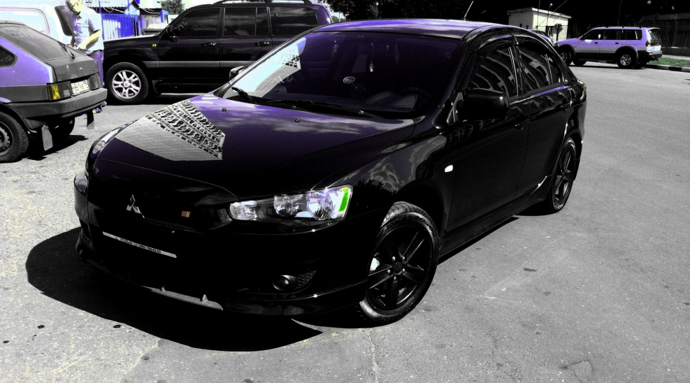 Mitsubishi Lancer 10 черный тонированный