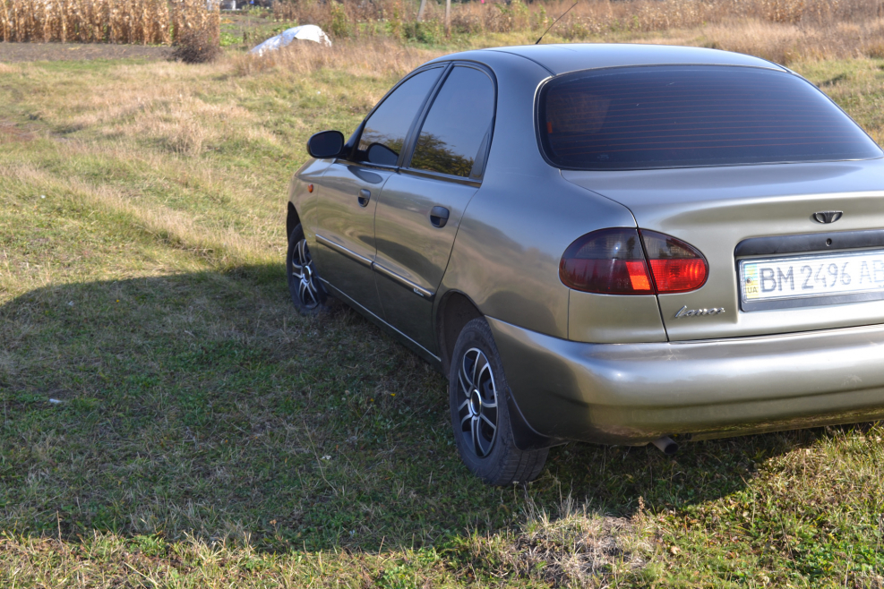 Chevrolet lanos серебристый в комплектации SX