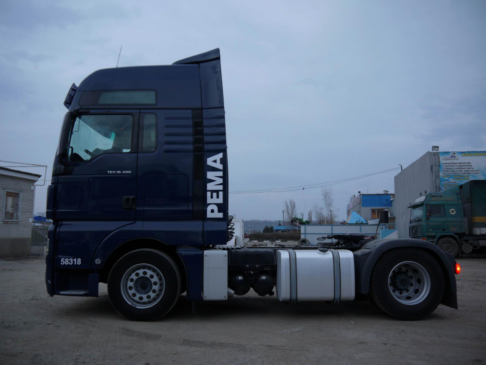 Man TGX 18.440 XXL C полуприцепом