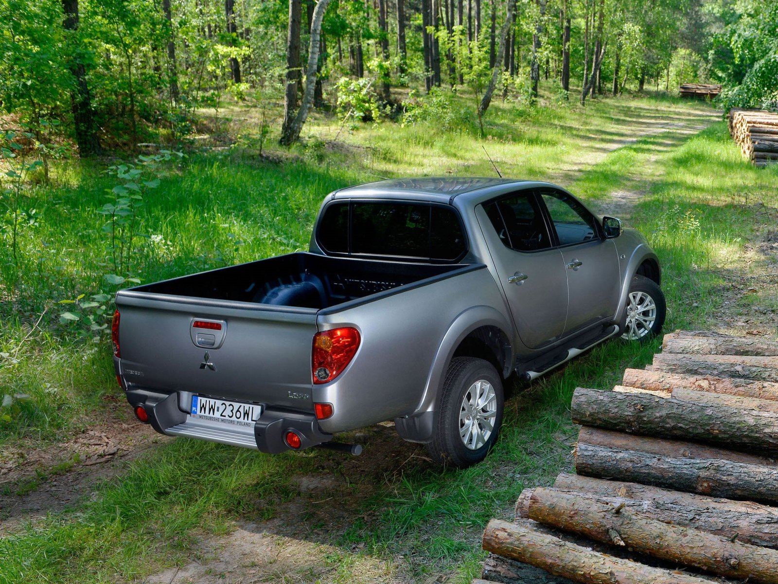 Мицубиси l200. Mitsubishi пикап l200. Пикап Митсубиси л200. Mitsubishi l200 4. Мицубиси л200 4 поколения.