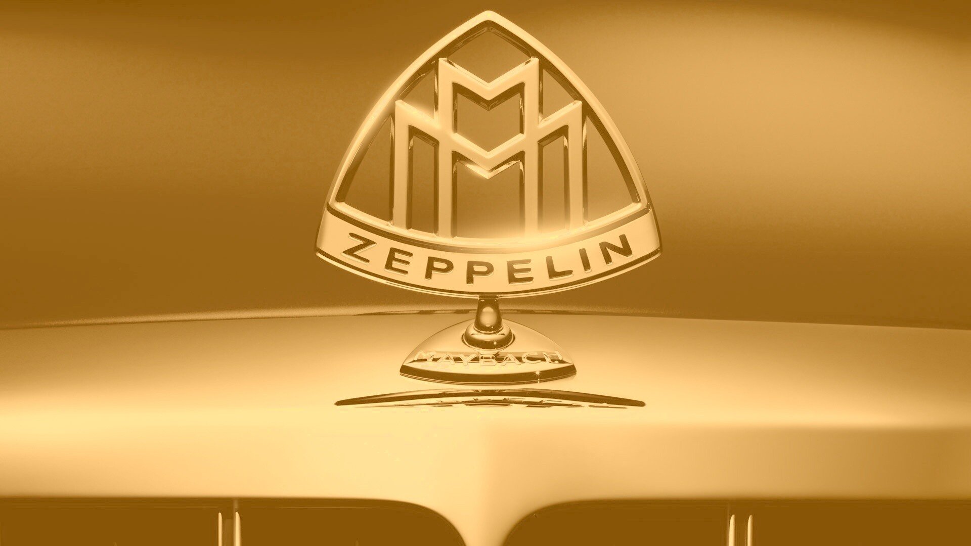 Логотип Майбах золотой
