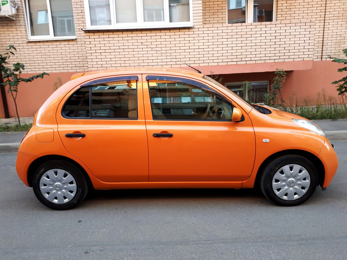 Марч филипс. Ниссан Марч к12. Ниссан Марч 2002 оранжевый. Nissan Micra Orange. Ниссан Марч оранжевый.