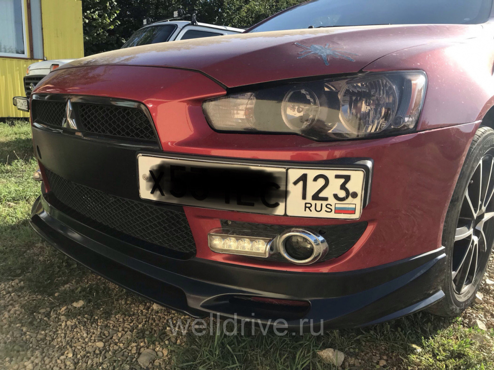 Бампер Мицубиси Лансер 10 передний