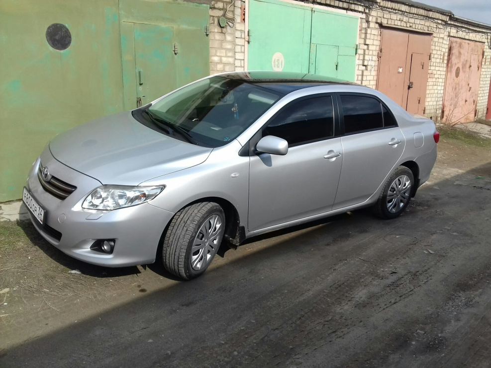 Тойота Королла е150 серебристая