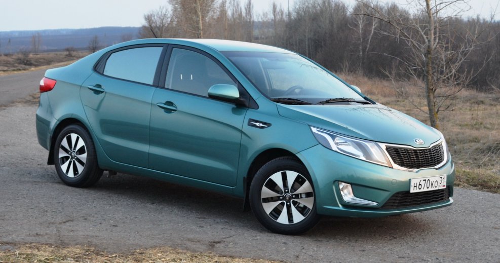 Kia Rio бирюзовая
