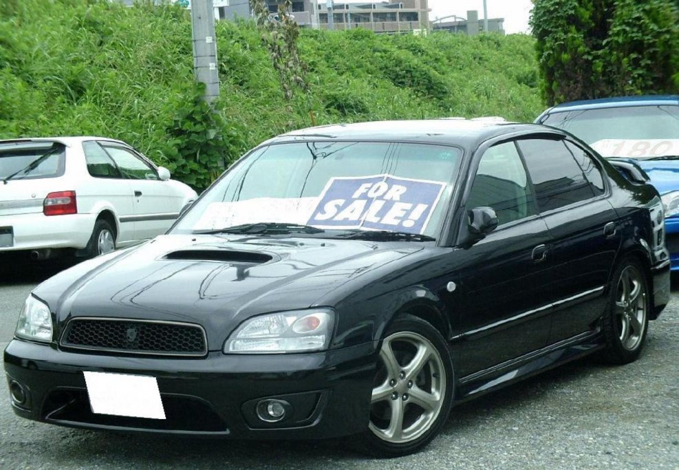 Черный Subaru Legacy bl5 2003