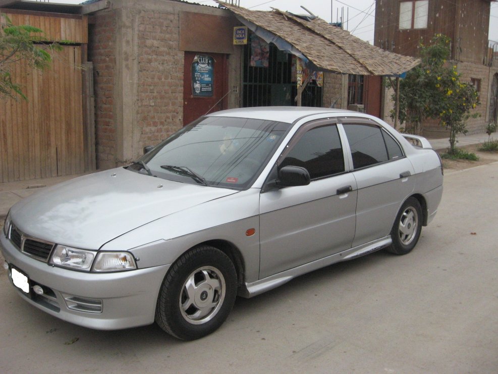 Мицубиси Мираж 2000