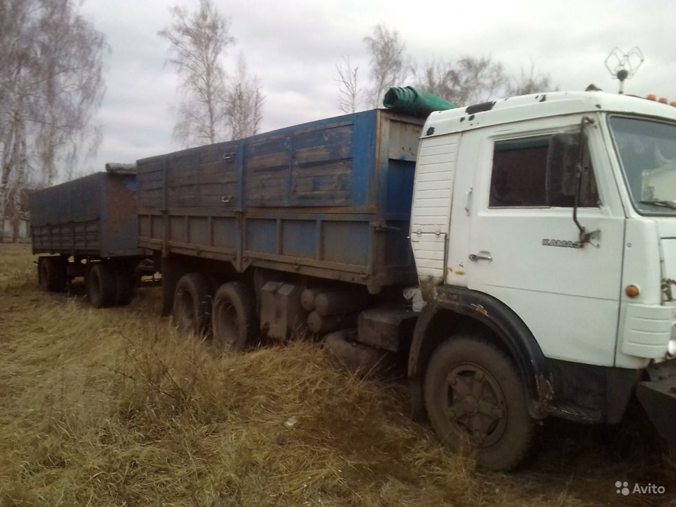 КАМАЗ 65115 зерновоз с прицепом бортовой
