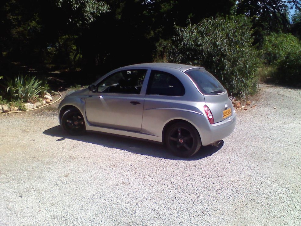 Nissan Micra k12 черные фары