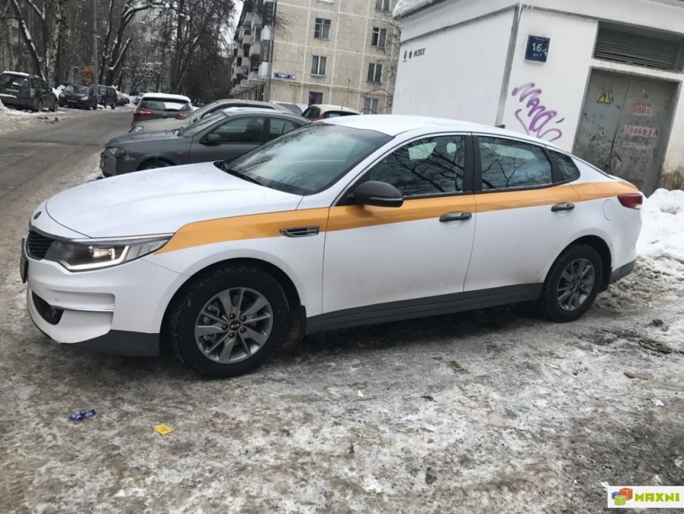 Kia Оптима жёлтая