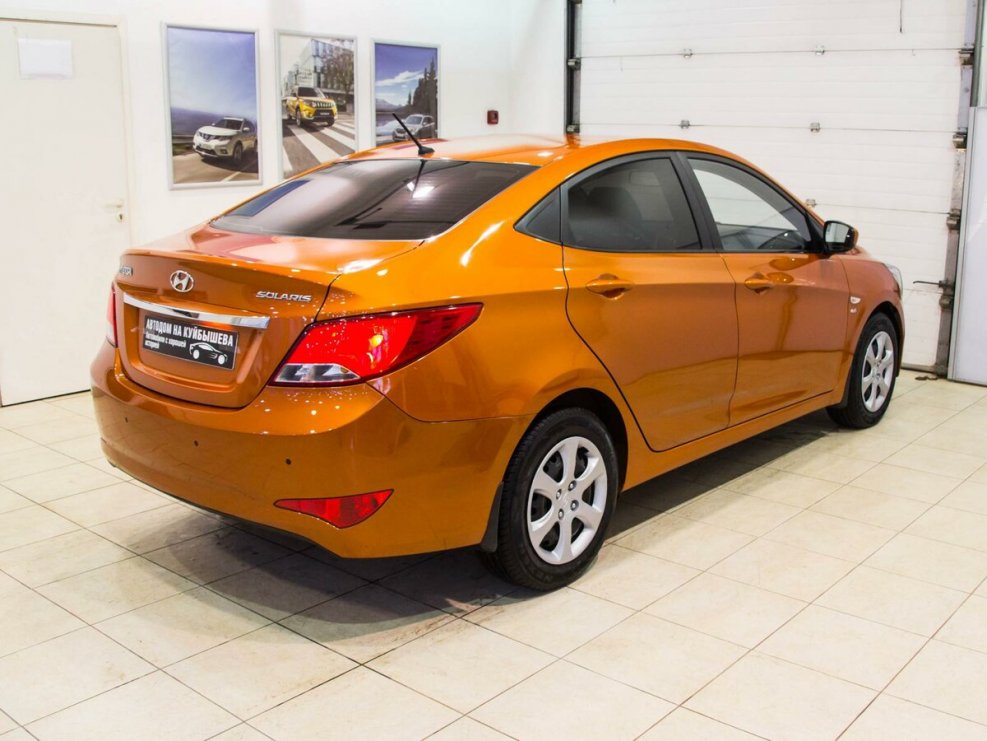 Hyundai Solaris 2014 оранжевый