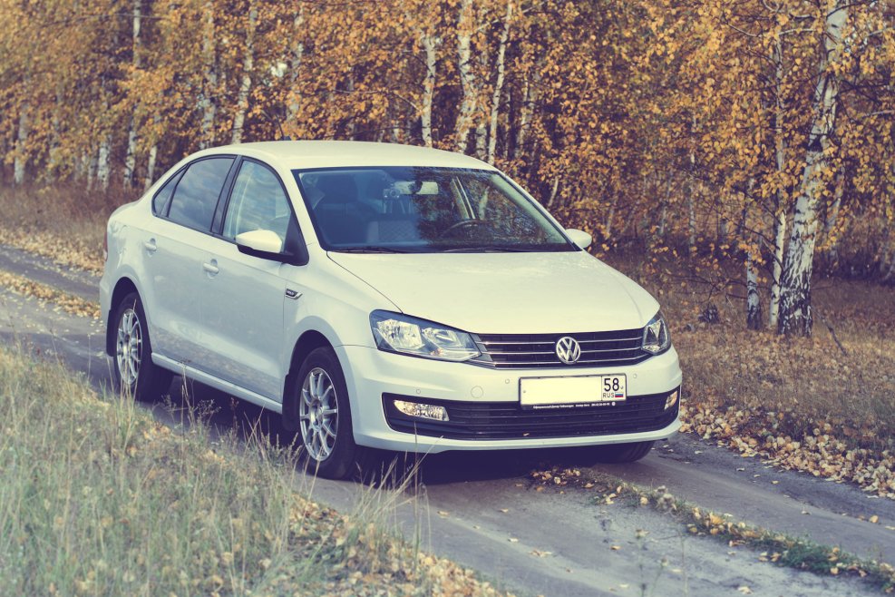 White Silver Polo sedan
