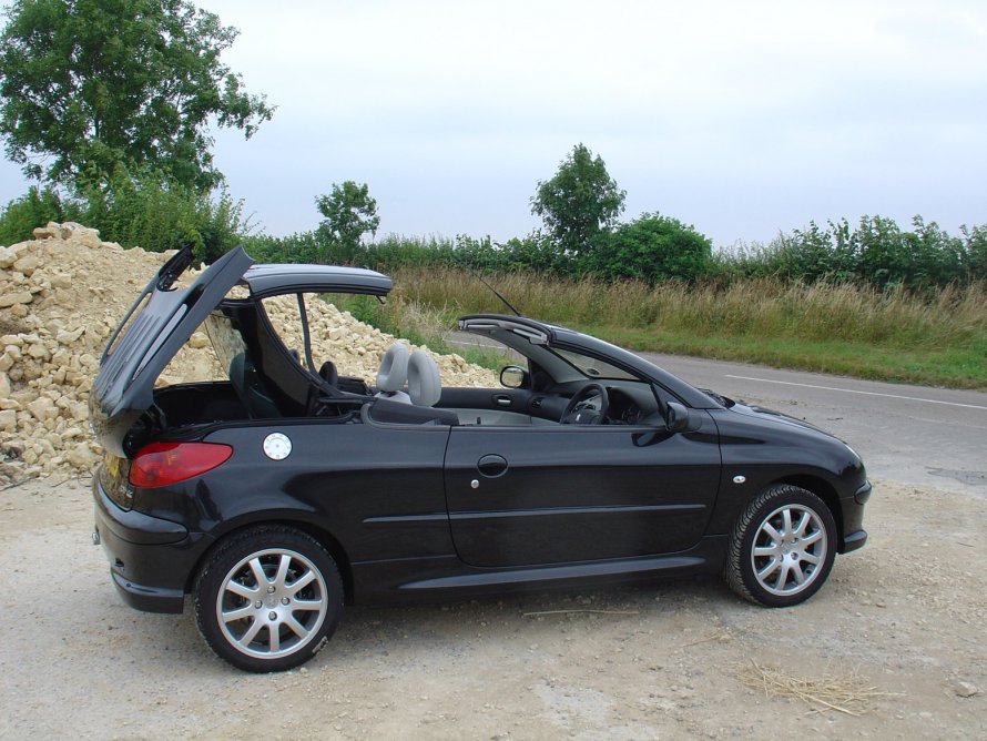 Пежо 206 2006 года красная