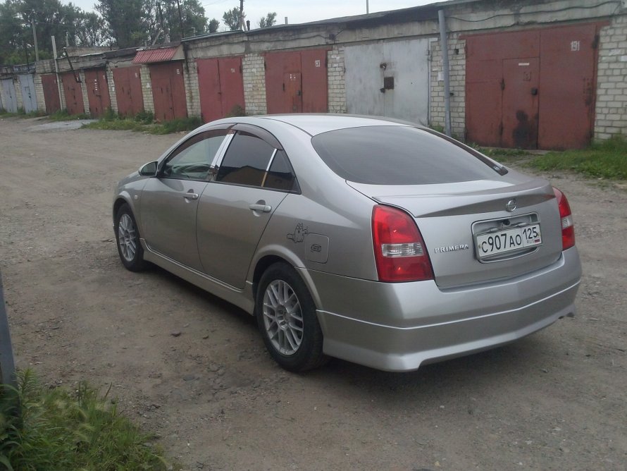 Nissan primera р12 поднятая