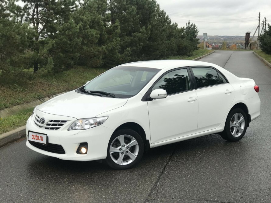 Тойота Королла e150 белый