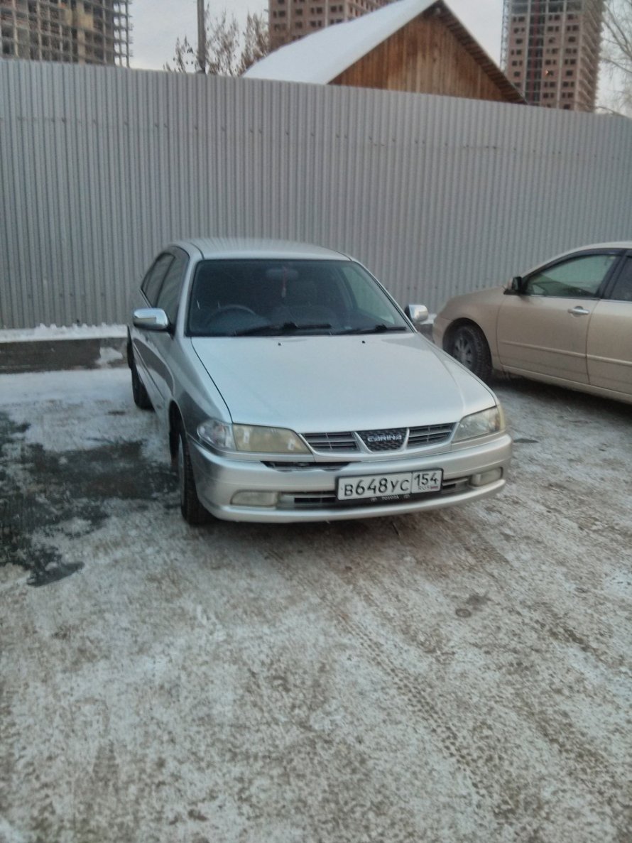 Toyota Carina at211 белого цвета тюнингованная