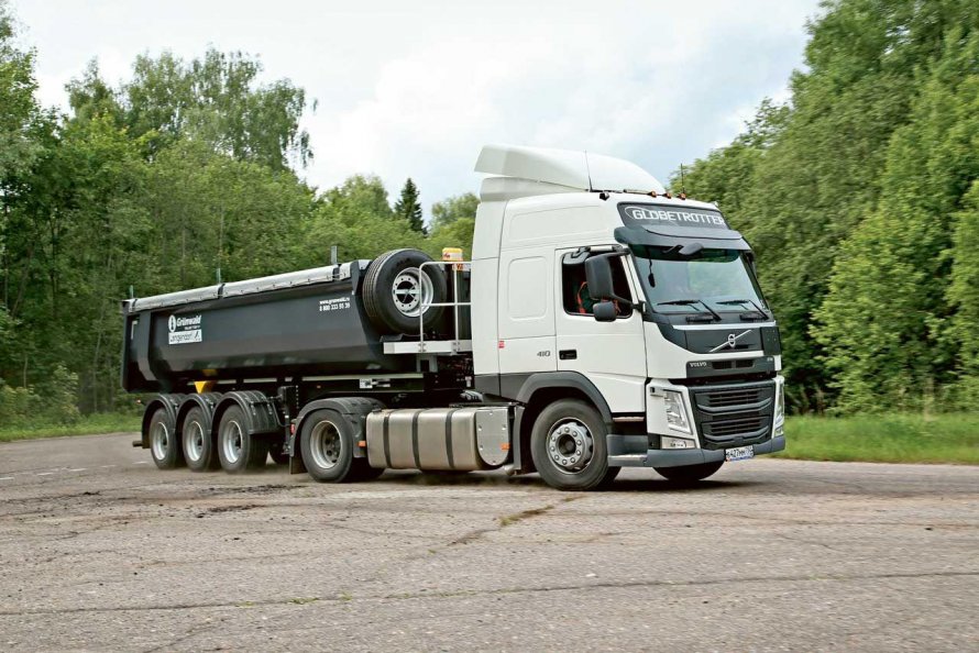 Volvo с самосвальным полуприцепом