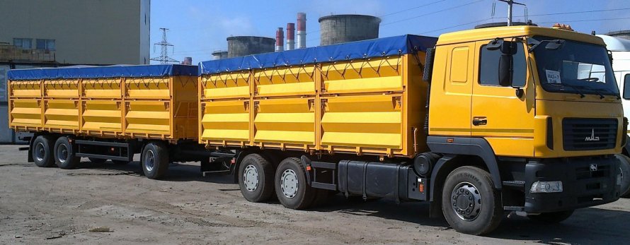 МАЗ 5550 зерновоз с прицепом