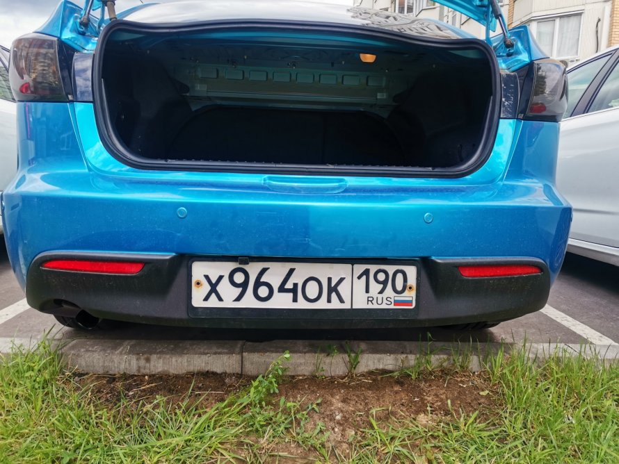 Задний вид Мазда 32007 год