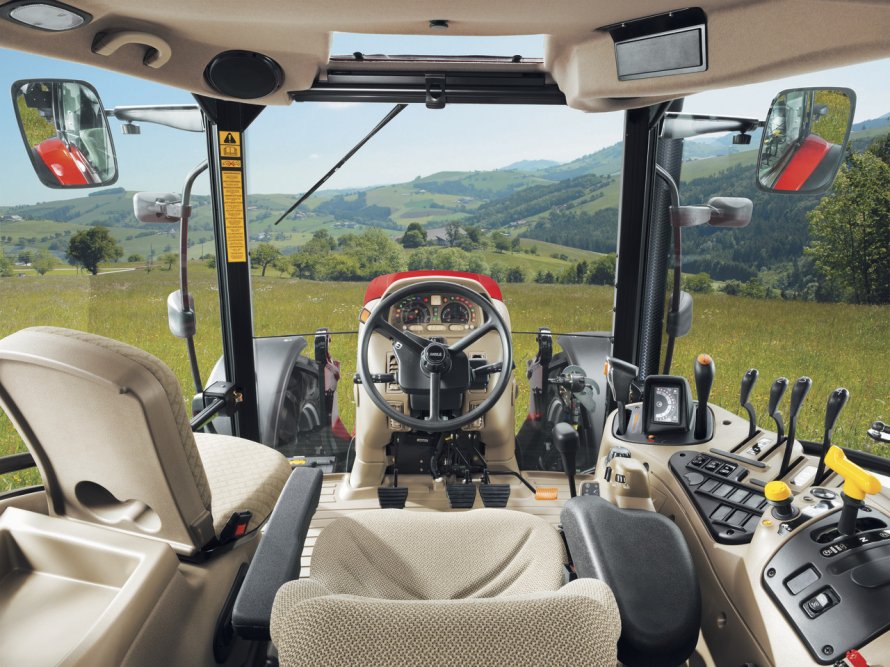 Maxxum 140 кабина