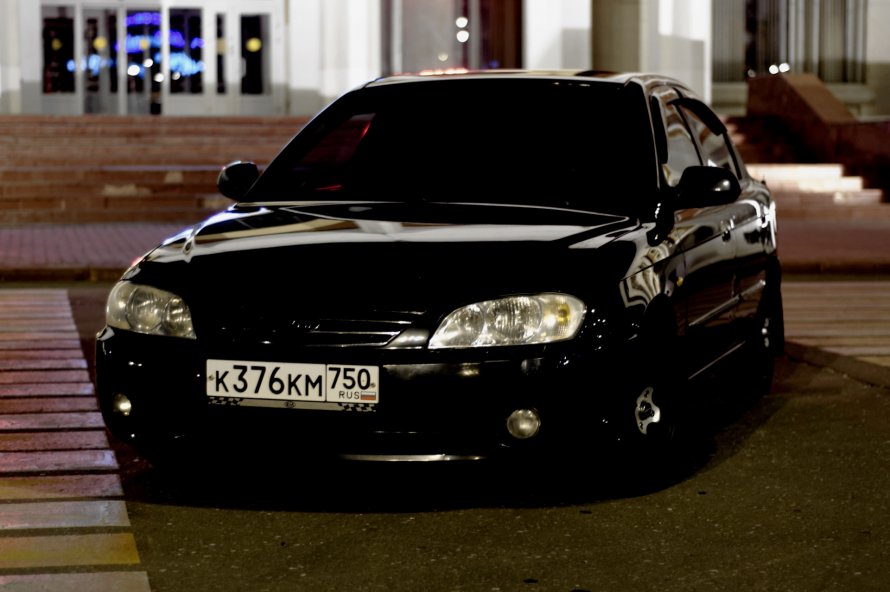 Kia Spectra черная тонированная