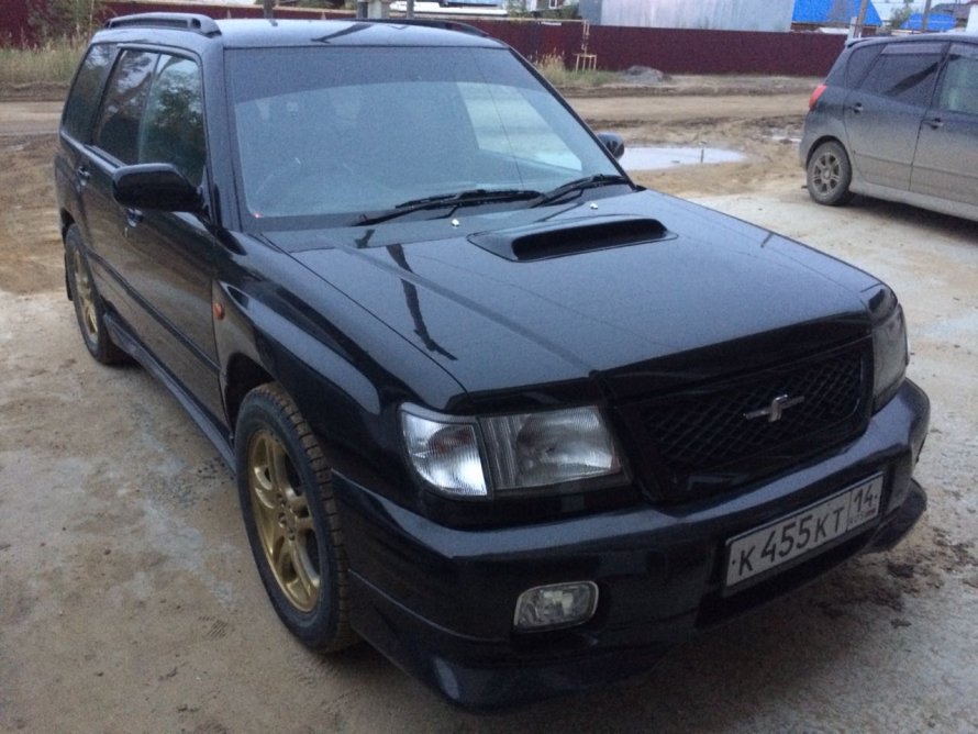 Чёрный Subaru Forester 1997 г Москва