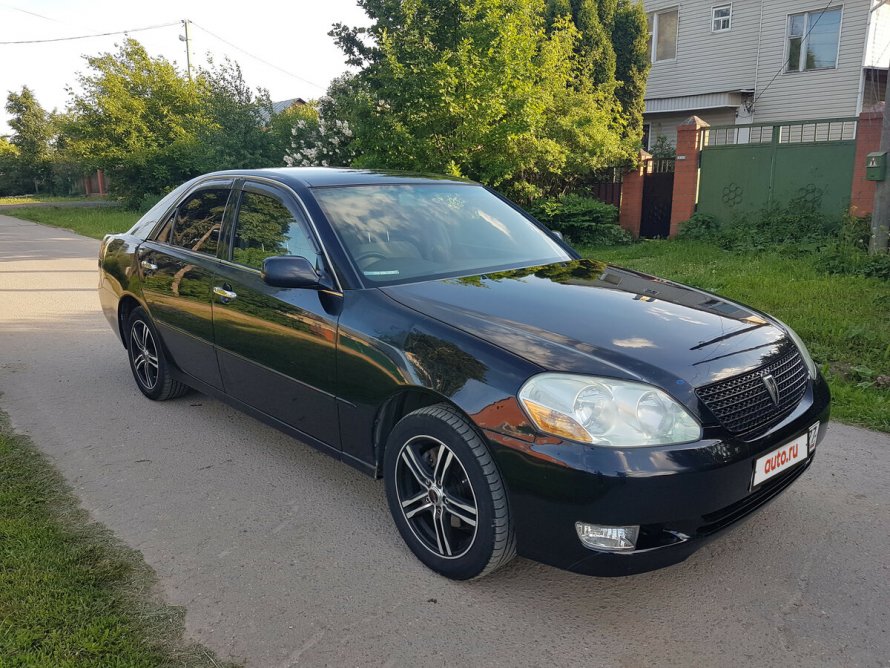 Тойота Королла хэтчбек 2002