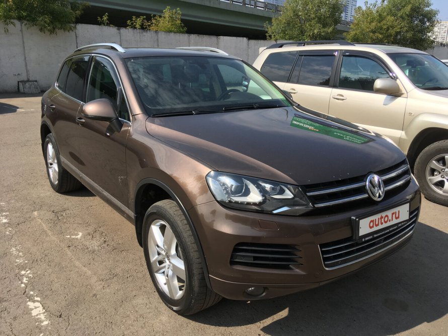Volkswagen Туарег коричневый цвет