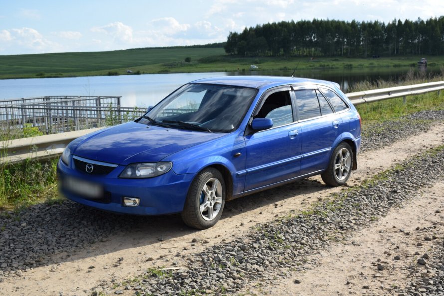 Mazda 323 vi (bj)