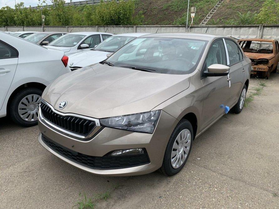 Skoda Rapid бежевый