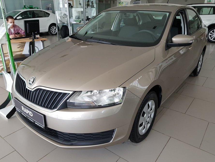 Skoda Rapid бежевый металлик