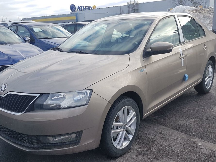 Skoda Rapid бежевый металлик