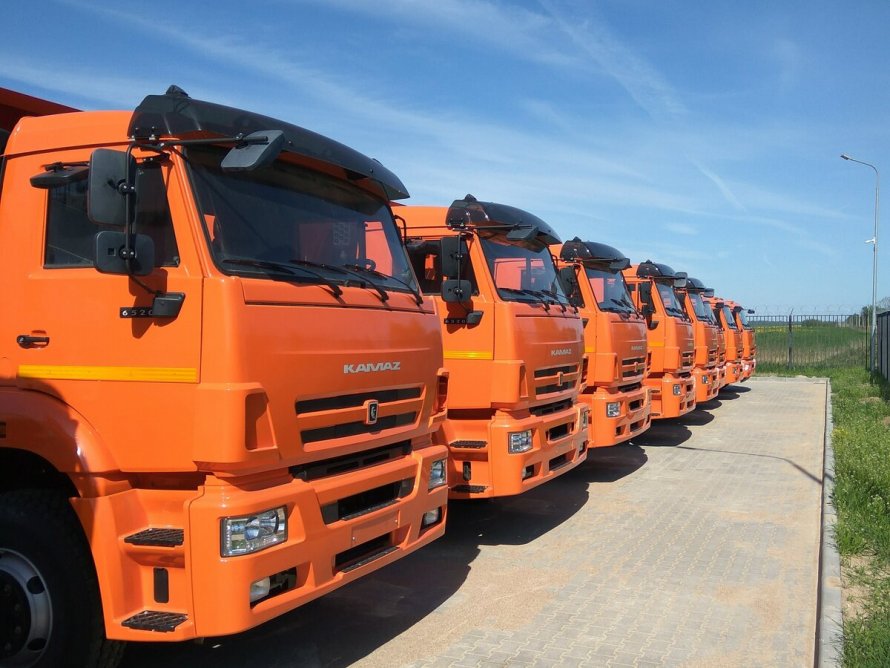 КАМАЗ 65115 бортовой оранжевый