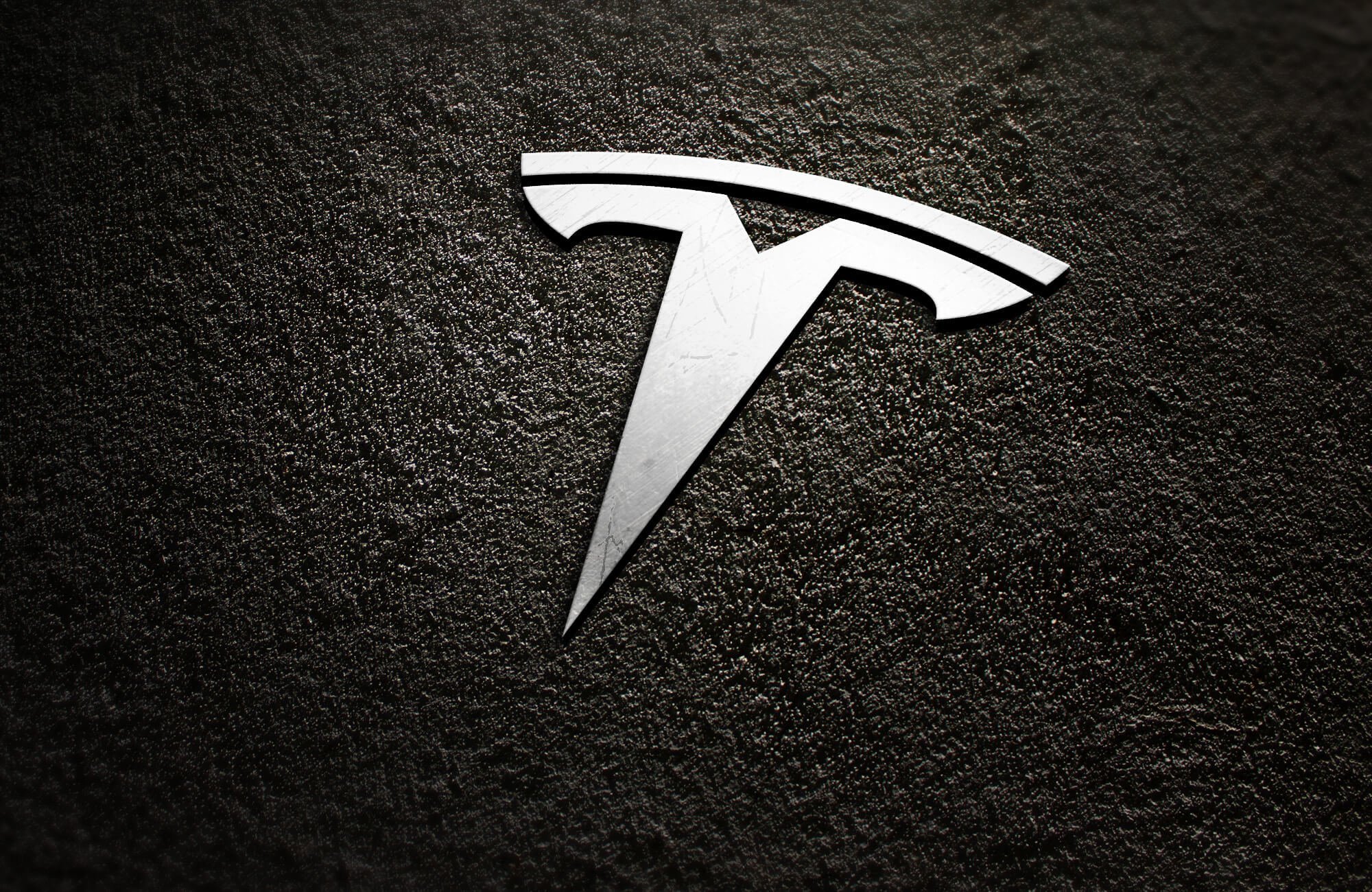 Знак теслы на машине. Тесла лого. Tesla Motors logo. Тесла знак. Тесла знак компании.