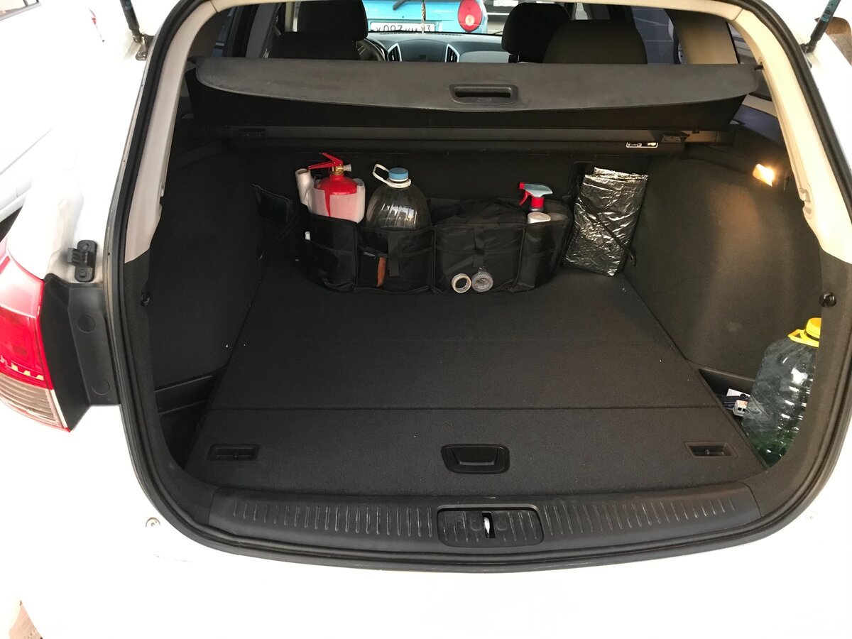 Chevrolet Cruze универсал 2013 багажник. Шевроле Круз универсал багаж. Шевроле Круз универсал фото багажника. Полка для Шевроле Круз универсал 2014 год.