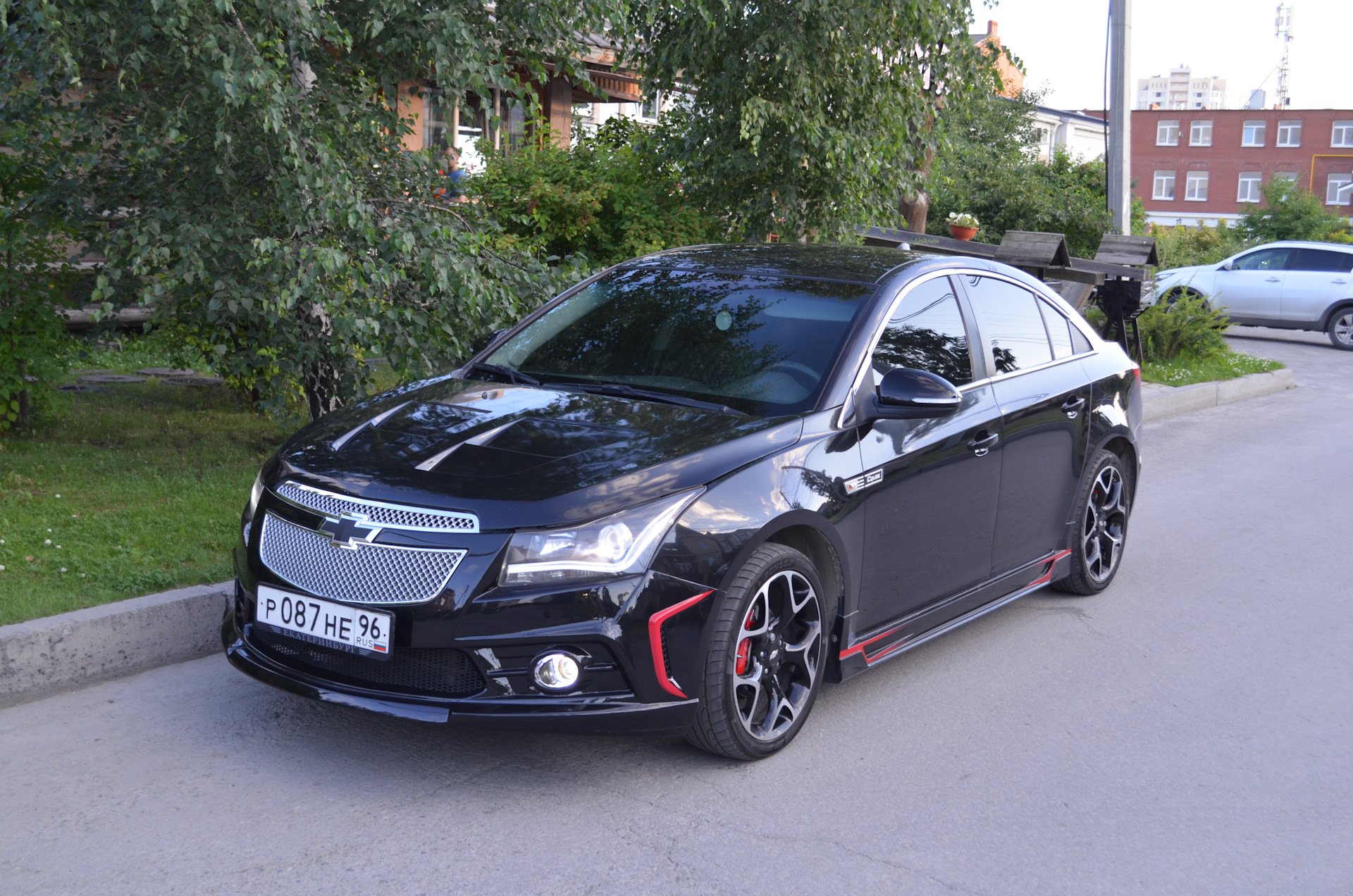 Тюнинг шевроле круз седан. Chevrolet Cruze, 2010 Tuning. Chevrolet Cruze обвес. Шевроле Круз в обвесе. Chevrolet Cruze 2012 с обвесами.