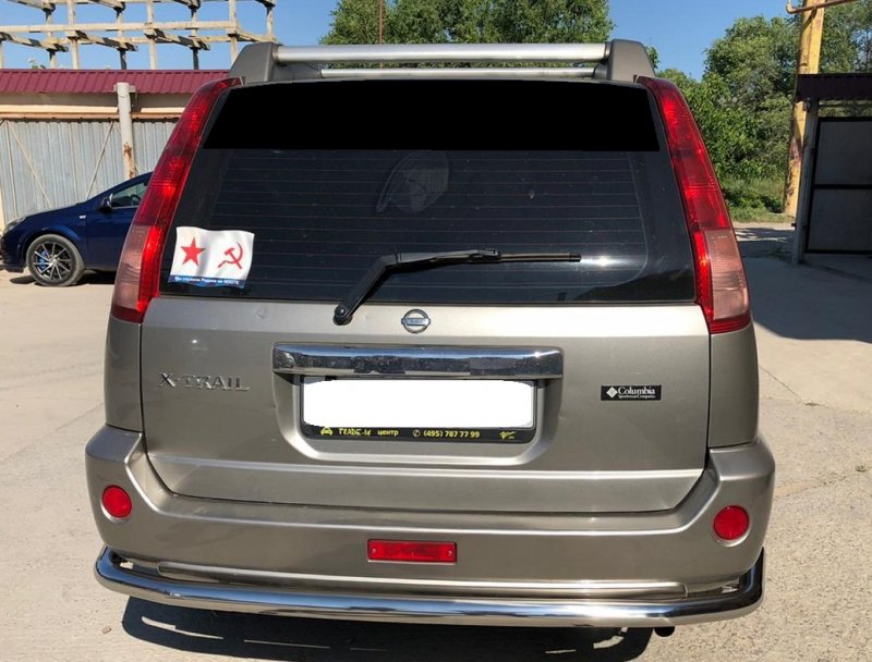 Задний бампер Nissan Tiida