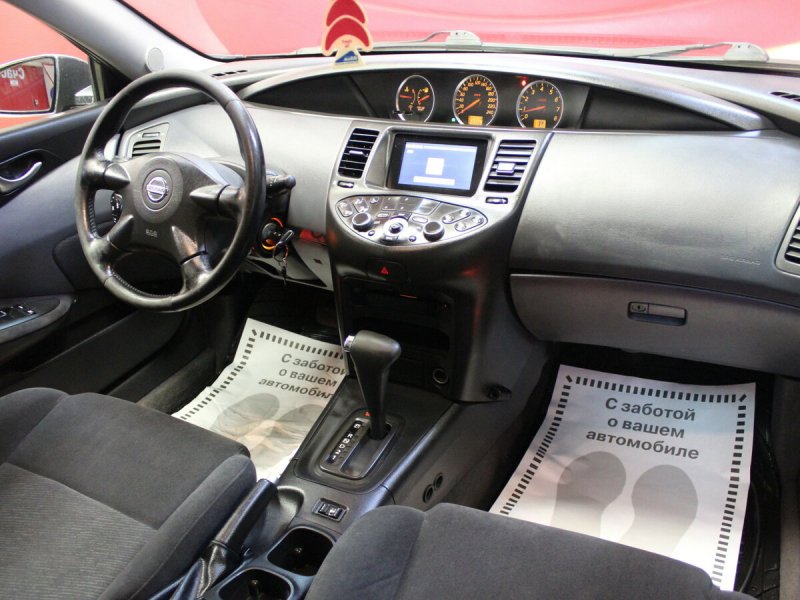Ниссан примера р12 2003г салон