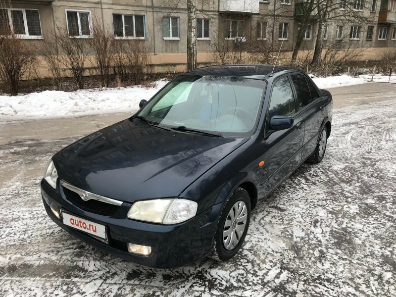 Mazda 325 v