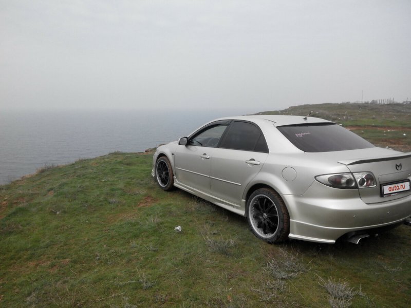 Мазда 325 2003