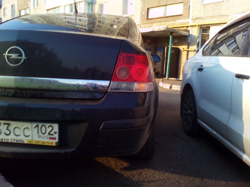 Opel Astra h седан задняя фара