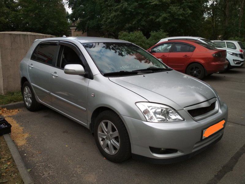 Тойота Королла е120 2002
