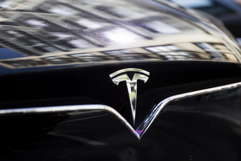 Tesla Motors значок