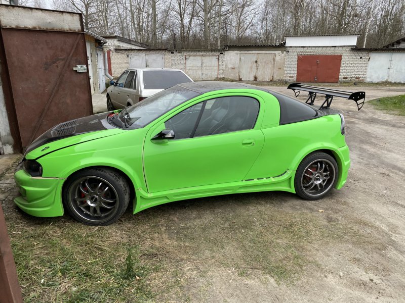 Опель тигра r16