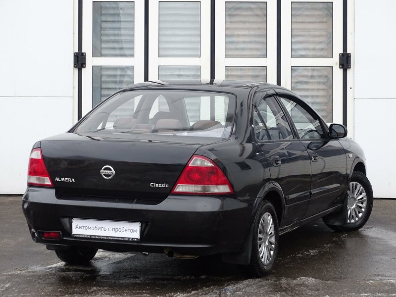 Nissan Almera g11 черная тонированная