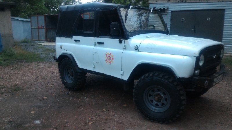 УАЗ 31519 цвет белая ночь